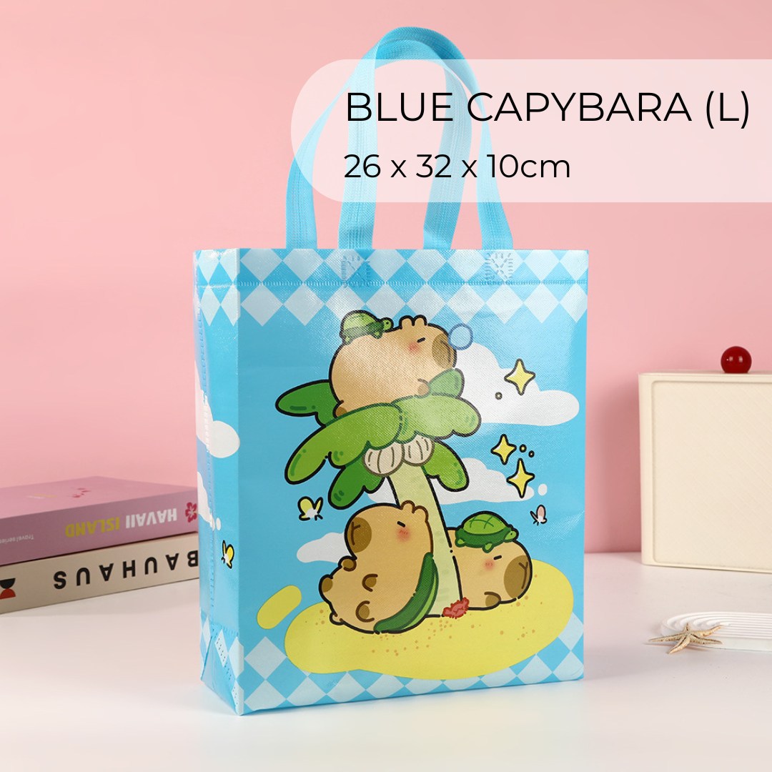 Eco-friendly blue capybara goodie bag, large size, non-woven, waterproof, vibrant design, reusable packaging.