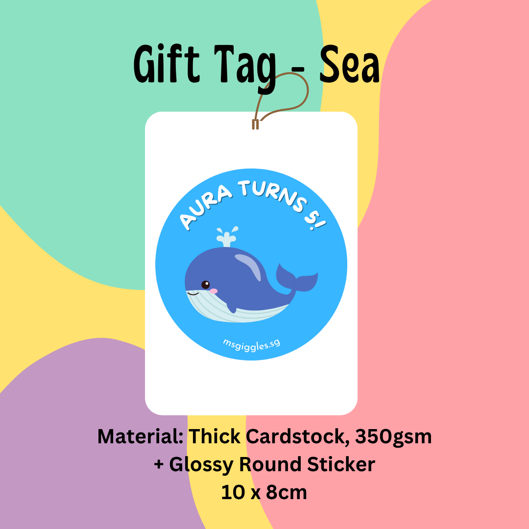 Gift tag featuring blue whale design with "Aura turns 5!" message, round sticker, 10x8cm, MsGiggles branding.