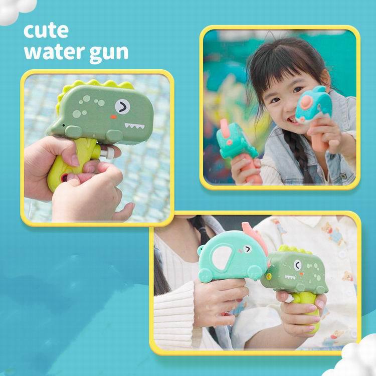 Cute colorful water guns in shark, dolphin, elephant, and dino designs held by children for outdoor play and parties