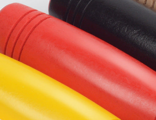 Close-up of colorful Mokuru Fidget Toy wooden sticks in yellow, red, and black colors