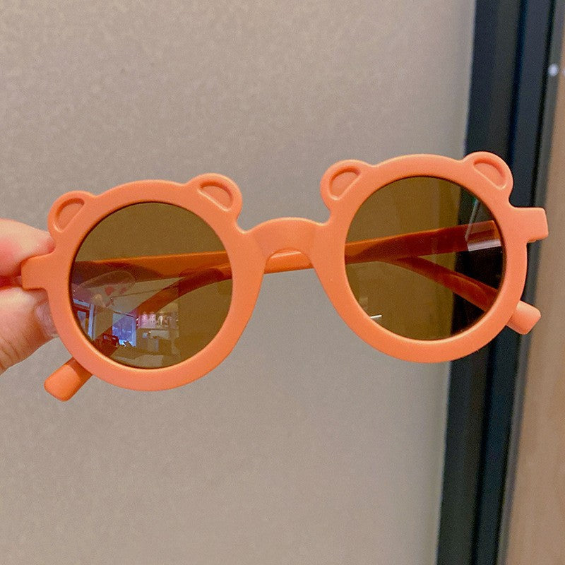 Kids Nordic Sunglasses with playful bear-shaped design, perfect for parties and style.