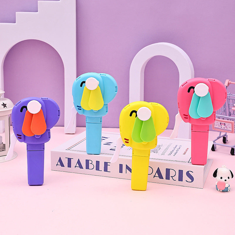 Colorful cute handheld fans with elephant designs in blue, yellow, pink, and purple on a pastel background