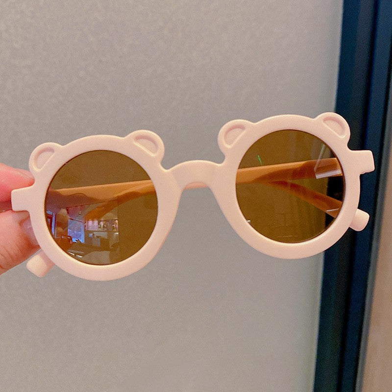 Kids Nordic sunglasses with playful bear-shaped frames.