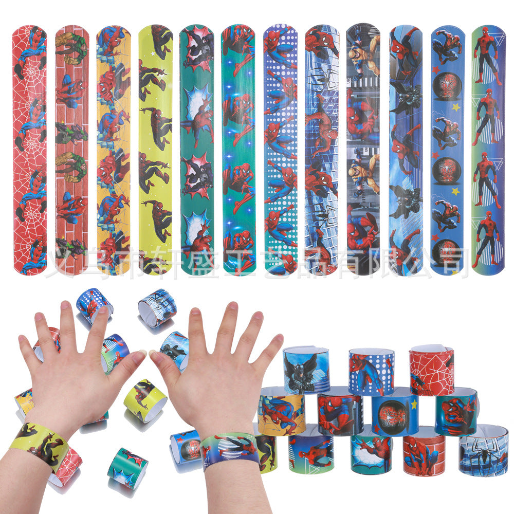Snapon wristband with assorted designs for kids, featuring unicorn, dinosaur, mermaid, and more themes, perfect party favor.