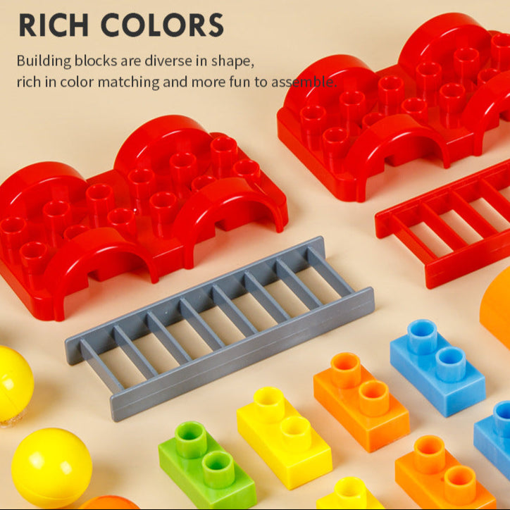 Colorful vehicle building blocks including red curved pieces, gray ladder, and small blue, orange, yellow, and green blocks arranged on a beige surface